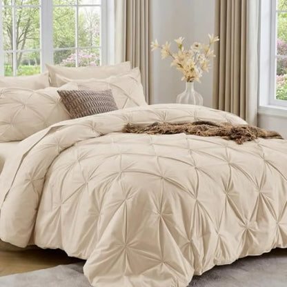 Enjoy the plush comfort of the Queen 7-Piece Pintuck Comforter Set, making it easy to create a stylish and sophisticated bedroom.
