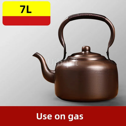 Copper Teapot 100% Pure Handmade – Cozy old-world tea station with the vintage kettle and wooden tray.