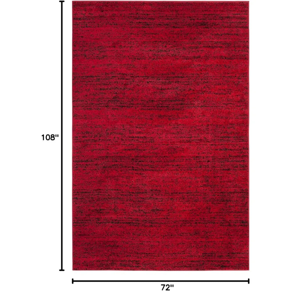 Close-up of the Modern Black & Red 6' x 9' Loomed Area Rug texture, ideal black and red rug that is kid and pet friendly.