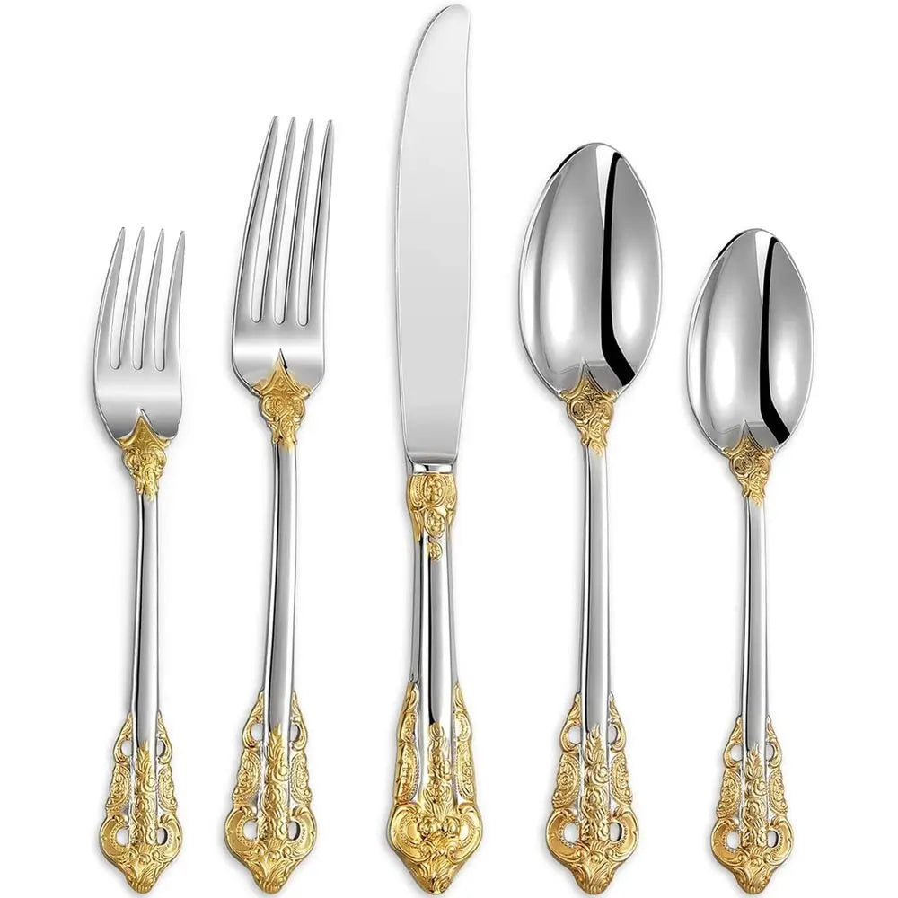 Everly Quinn Luxury Gold Accent Flatware Set beautifully arranged on an upscale dining table, emphasizing the luxurious feel of this flatware.