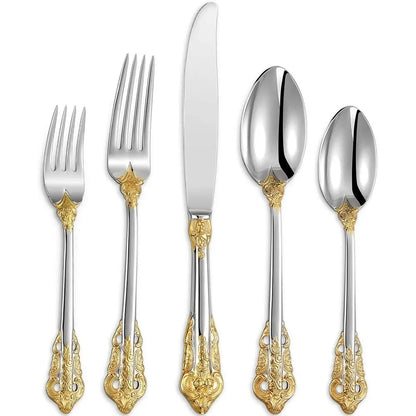 Everly Quinn Luxury Gold Accent Flatware Set beautifully arranged on an upscale dining table, emphasizing the luxurious feel of this flatware.