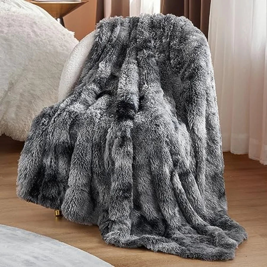 Cute pet lounging on the 50x60 Grey Faux Fur Sherpa Throw Blanket, Plush Reversible showing its pet-friendly design.