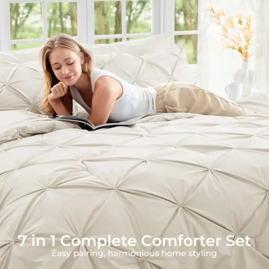 Take your bedroom décor to the next level with the elegant Queen 7-Piece Pintuck Comforter Set, perfect for creating a cozy, modern sanctuary.