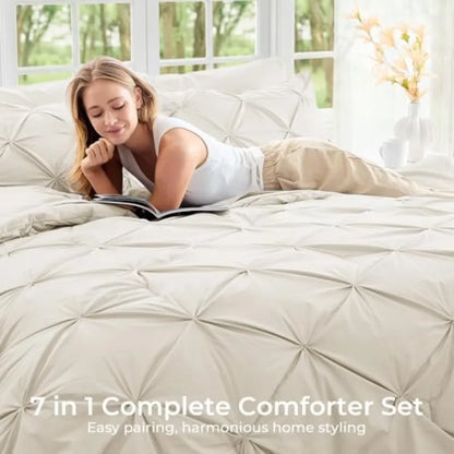 Take your bedroom décor to the next level with the elegant Queen 7-Piece Pintuck Comforter Set, perfect for creating a cozy, modern sanctuary.
