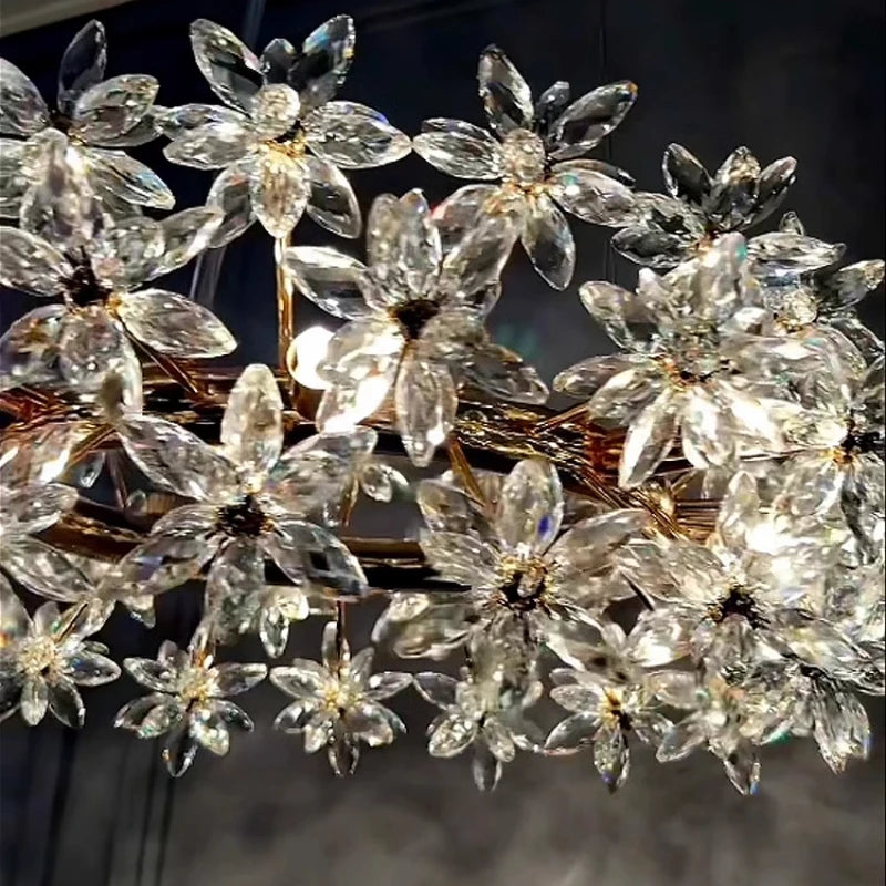 Elegant Crystal Flower Petals Chandelier - Elegant crystal flower chandelier positioned to create a warm and inviting ambiance in a chic living space.