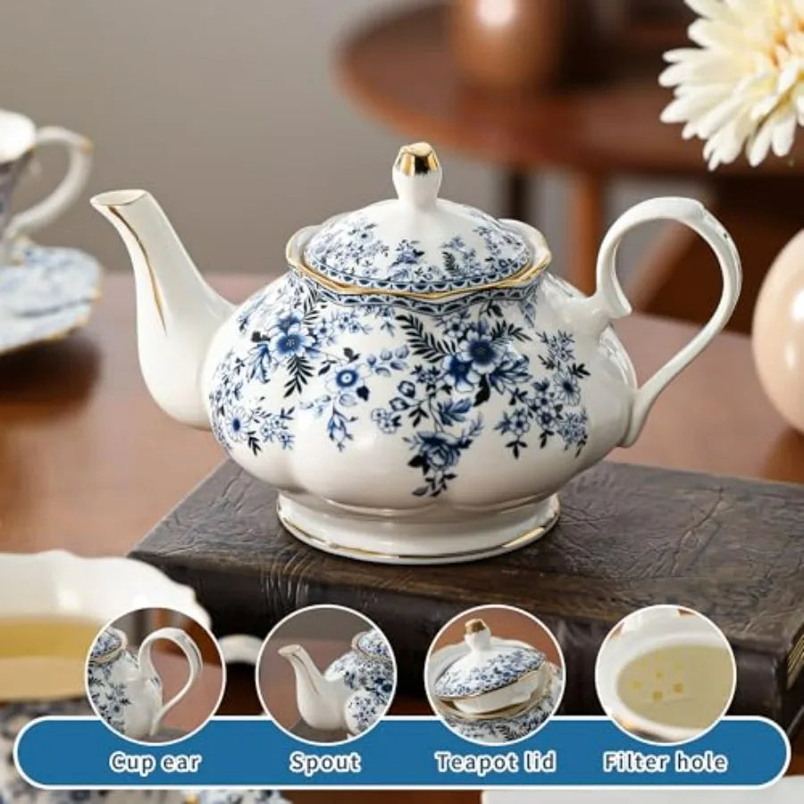 Elegantly styled Vintage Blue Floral Bone China Teapot Set with gold trim and floral accents.