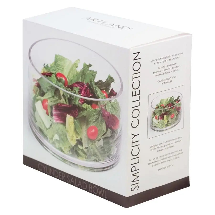 The 9" Clear Handcrafted Glass Salad Bowl displayed elegantly on a dining table, perfect for enhancing any meal.