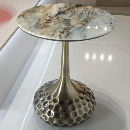 Artisan top accent tables in a stylish living room setting, showcasing their modern and elegant brass bases.