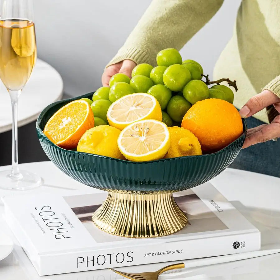Luxury Green Ceramic Pedestal Fruit Bowl with Gold Base – Elegant 10” Decorative Centerpiece styled with pastries, enhancing kitchen aesthetics.