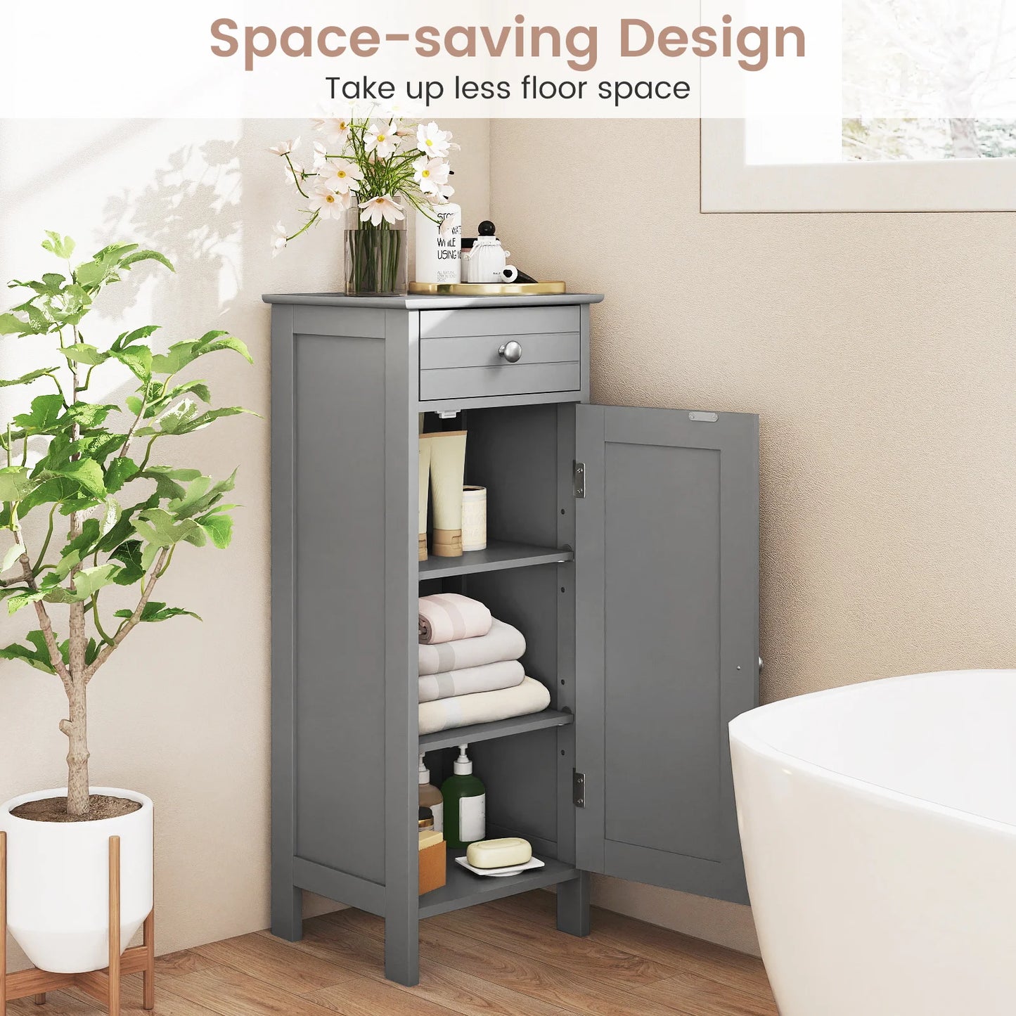 Slim Grey Bathroom Storage Cabinet placed beside a toilet, demonstrating its utility as a narrow 14" gray freestanding organizer for tight corners.