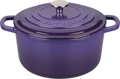Purple cast iron dutch oven 6QT on a rustic kitchen table, highlighting its aesthetic appeal in a modern kitchen.
