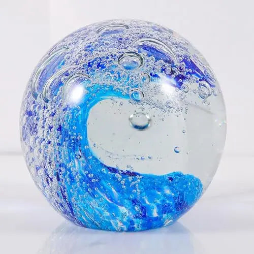 Hand-Blown Ocean Wave Glass Paperweight making a perfect gift for coastal enthusiasts or a stunning addition to modern decor.