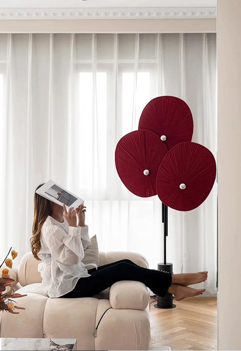 Elegant Modern Triple Floral Floor Lamp creating warm ambiance in a chic office space.