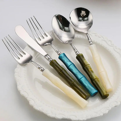 Flatware Set 18/10 Stainless Steel with Bamboo-Style Green Acrylic Handles – 5 Piece Bamboo Elite Cutlery for Modern Dining and Entertaining featuring elegant silver heads and olive green handles, perfect for upscale dining with stainless steel cutlery.