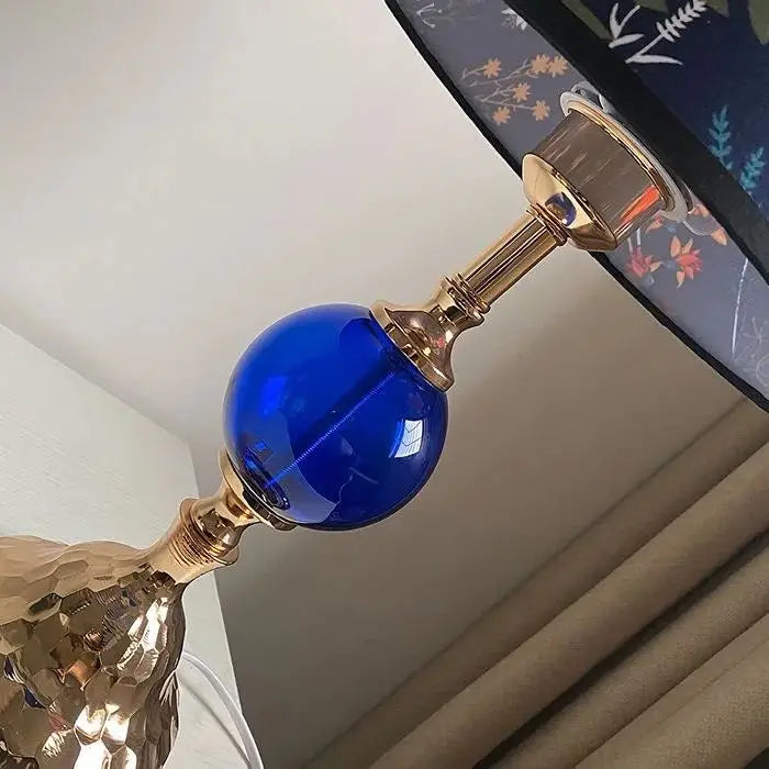 Full view of the Warm Romantic Touch Switch Bedside Lamp illuminating a dark room - a must-have modern bedside lamp for relaxation