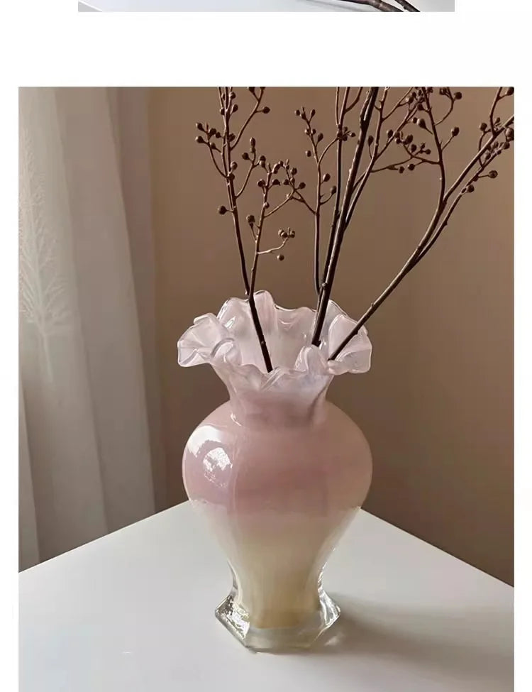 Beautifully lit Vintage 24Cm Opalescent Ruffled Edged Fenton Glass Vase reflecting light in various hues.