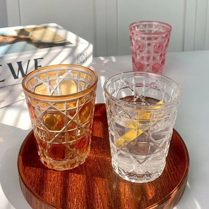 Vibrant colored Hand-Carved 6-Piece Cut-Crystal Tumblers Set in red showcasing exquisite detailing.