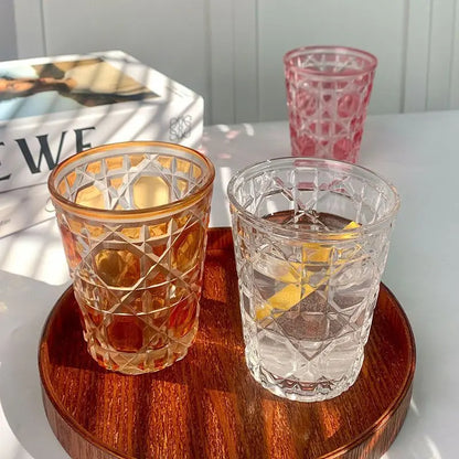 Vibrant colored Hand-Carved 6-Piece Cut-Crystal Tumblers Set in red showcasing exquisite detailing.