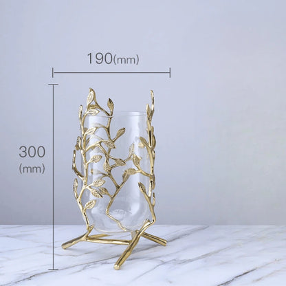 Showcasing the Elegant Clear Glass Vase with Gold Metal Branches that adds a touch of luxury to any interior.