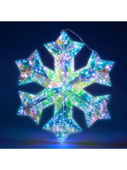 Unique 3D Iridescent Snowflake Ornament with 100 LED Cool White Lights - A shining 3D snowflake ornament glowing brilliantly against a dark backdrop.