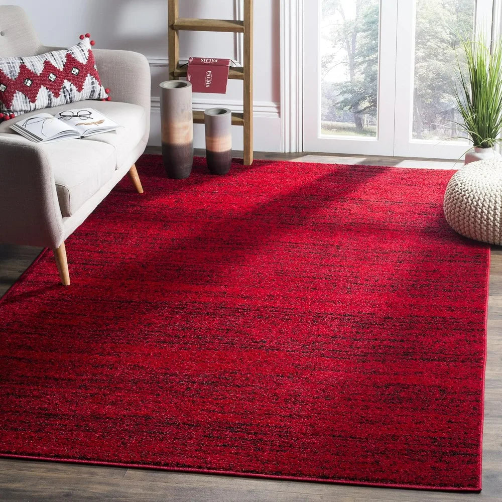 Modern Black & Red 6' x 9' Loomed Area Rug showcasing its abstract design, perfect as a black and red rug for contemporary spaces.