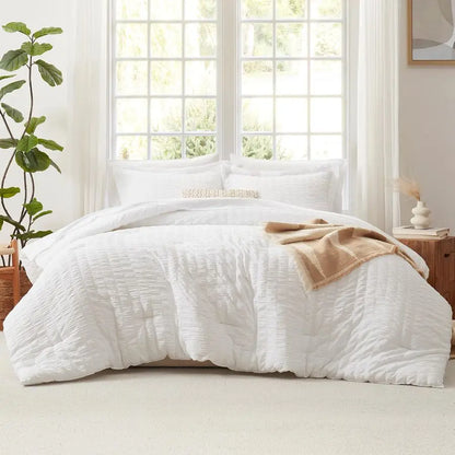 Complete view of the 7-Piece Luxury Queen Bedding Set in Winter White, showcasing the down alternative comforter and stylish pillow shams.