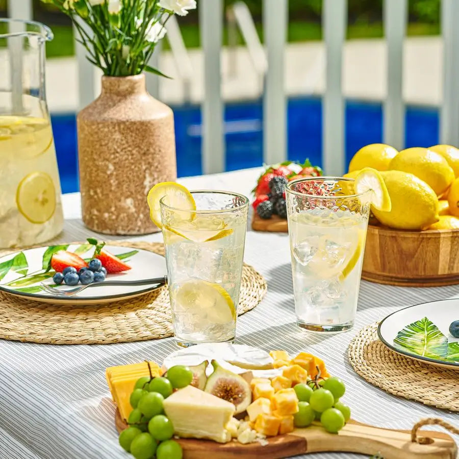 Versatile hammered glass tumblers, dishwasher safe and freezer friendly, ideal for any beverage.