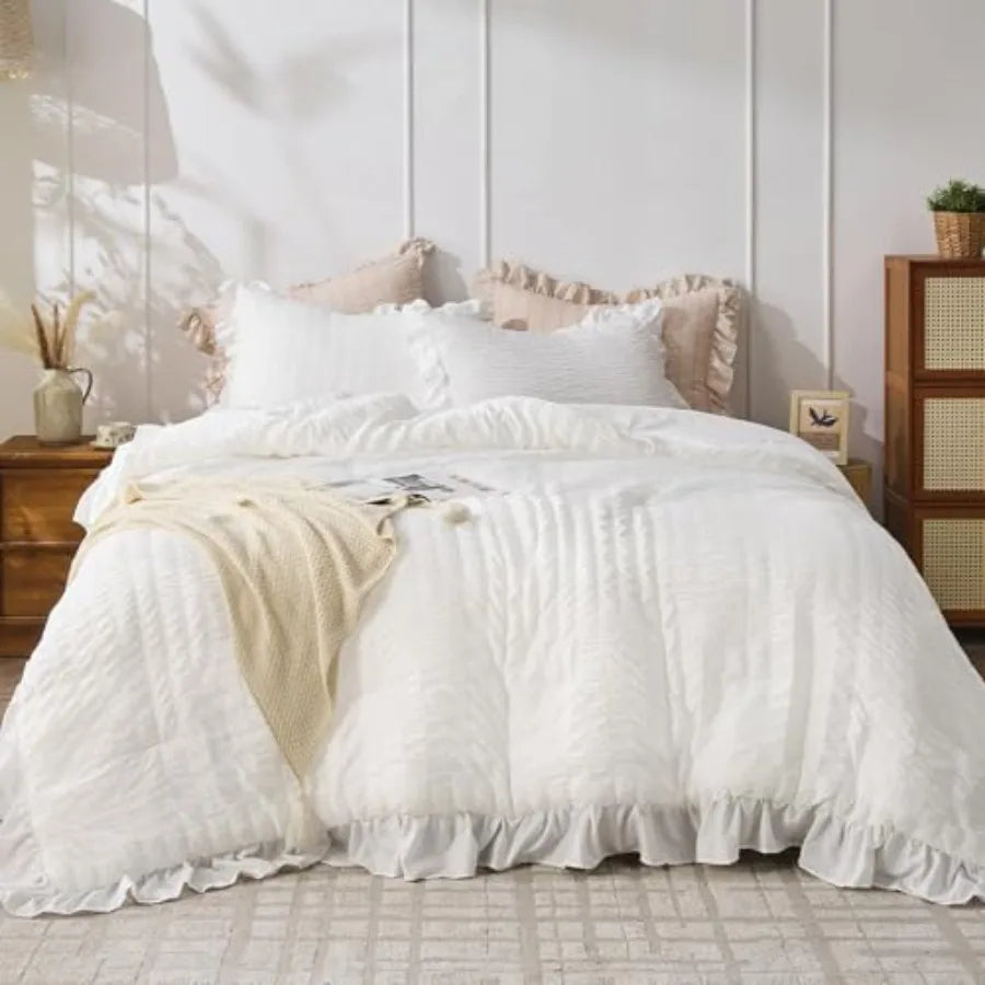 Elegant folding of the White Ruffle Comforter Set, emphasizing its fluffy filling and romantic farmhouse style.