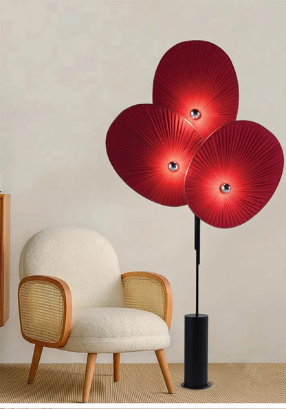 Elegant Modern Triple Floral Floor Lamp brightening up a stylish dining area.