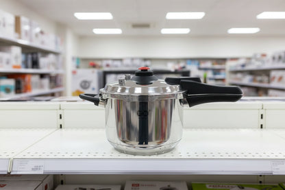 Heavy Duty 304 Stainless Steel 8.5 Quart Pressure Cooker ~ Serves 6-8 — shiny stainless steel pot on stove