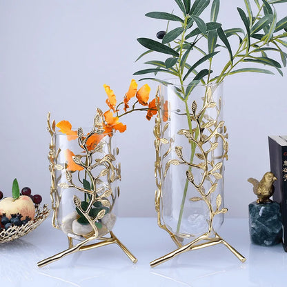 Elegant Clear Glass Vase with Gold Metal Branches showcasing modern minimalist design, featuring a stable three-legged base.