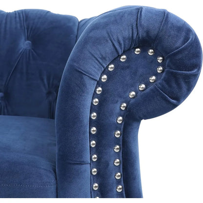 Blue Velvet Chesterfield Sofa – Cozy living room styled with an 84" tufted 3-seater couch, highlighting its plush blue velvet upholstery.