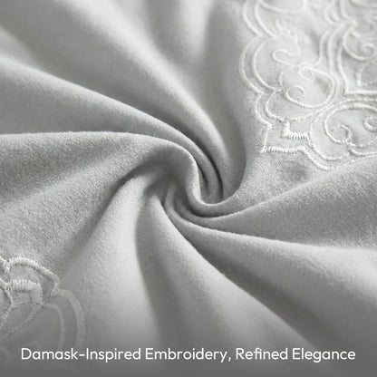 Luxurious decorative pillows from the Queen King Microfiber 6-Piece Comforter Set, Silver Medallion.