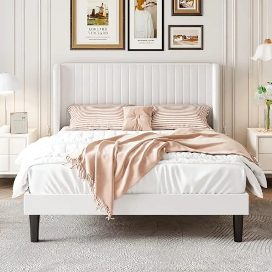 Side view of Luxury Velvet Wingback Bed Frame highlighting its stylish vertical channel tufting and strong build.