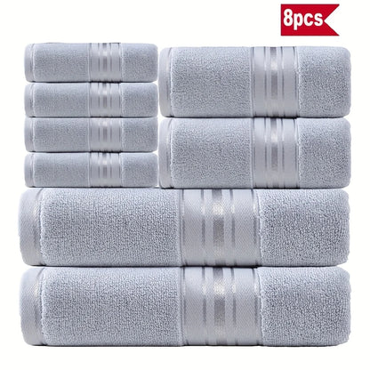 Vibrant turquoise 8-Piece Cotton Bath Towel Set with soft, absorbent fabric for a refreshing feel.