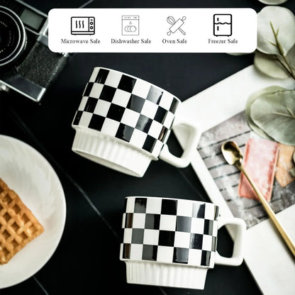 Lifestyle image of a Modern Checkered Black And White Ceramic coffee mug set on a table setting, emphasizing the chic design of the checkered coffee mug set.