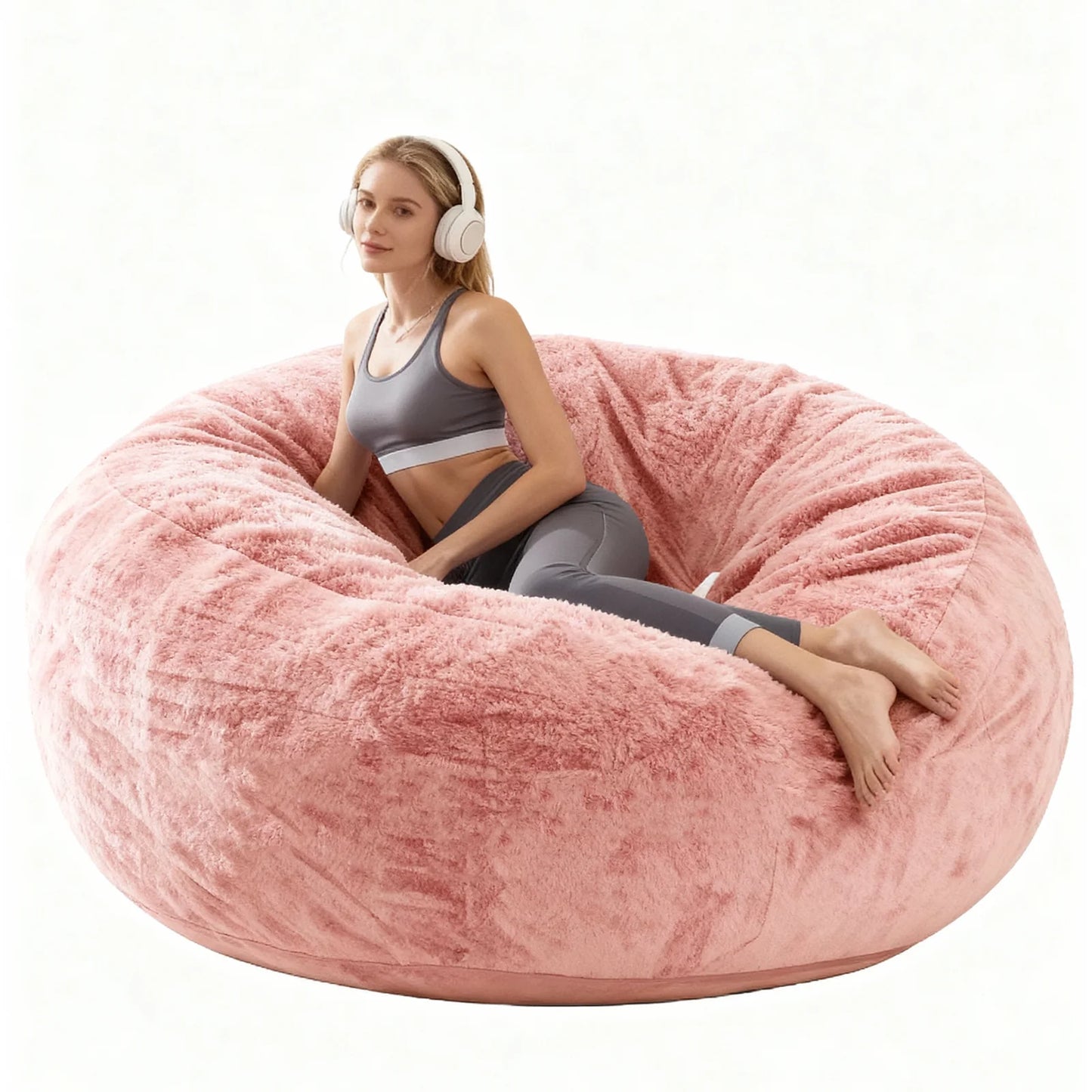 Comfy oversized bean bag chair in soft pink, perfect for creating a cozy reading nook.