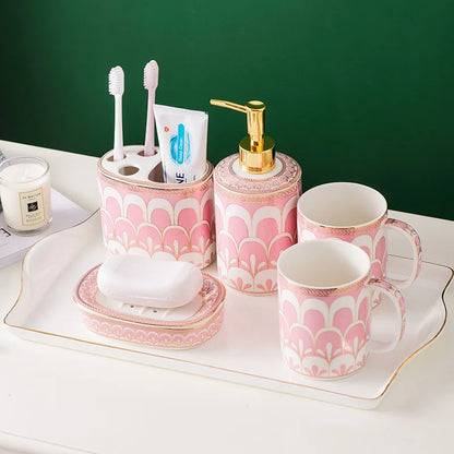 Stylish pink white gold Luxury Ceramic Hand Soap Dispenser set on a marble tray, enhancing the luxury feel of any bathroom.