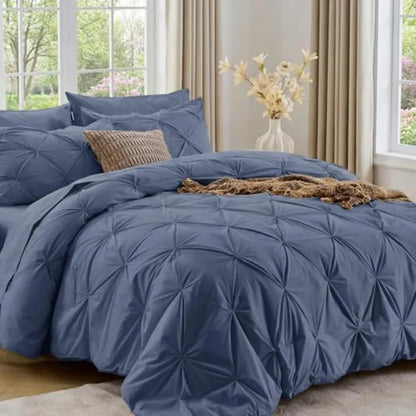This stylish Queen 7-Piece Pintuck Comforter Set is complete with all essential bedding items, ensuring an effortless setup for your bed.