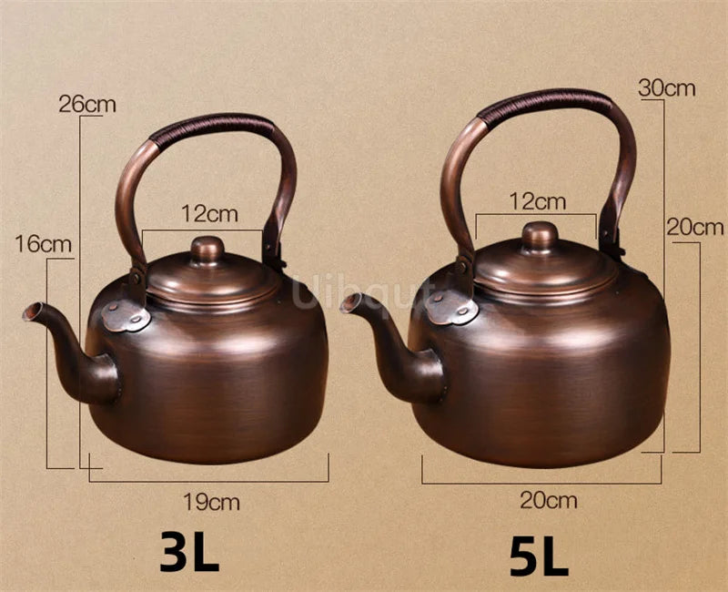 Copper Teapot 100% Pure Handmade – Vintage whistling tea kettle displayed on a rustic kitchen countertop.