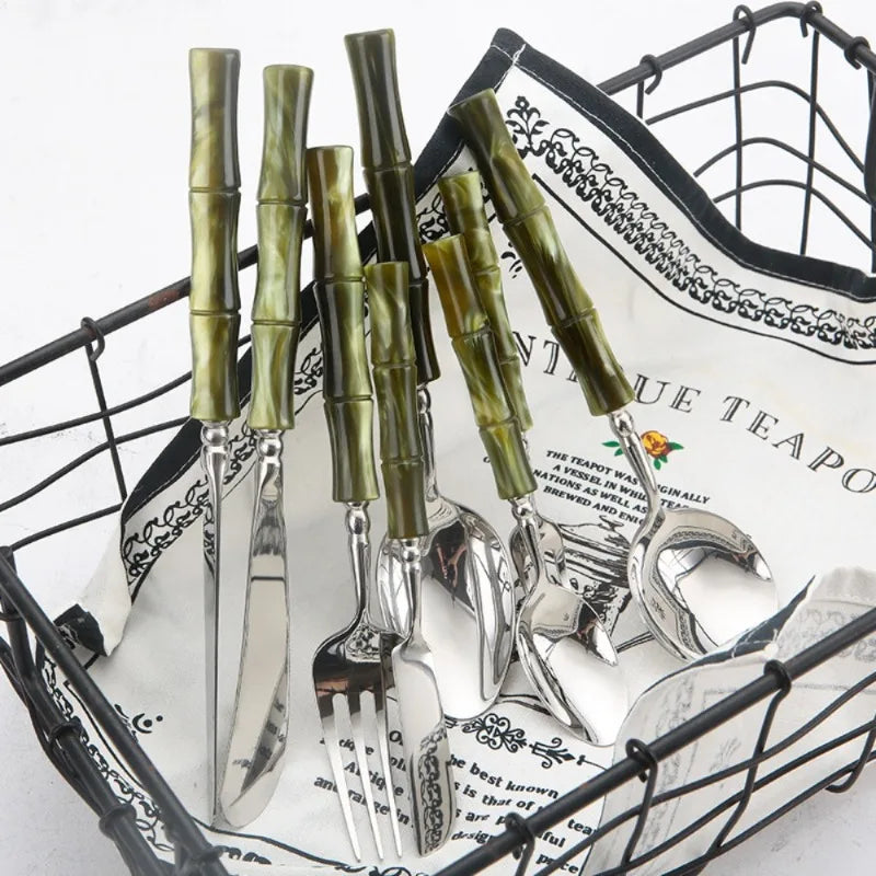 Flatware Set 18/10 Stainless Steel with Bamboo-Style Green Acrylic Handles – 5 Piece Bamboo Elite Cutlery displayed on a dining table, offering a modern twist to traditional stainless steel cutlery.