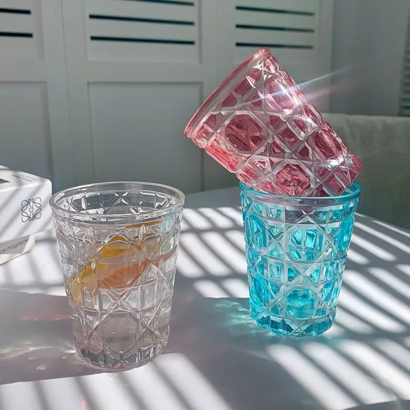 Hand-Carved 6-Piece Cut-Crystal Glass Tumblers Set in blue, perfect for enjoying your favorite beverages.