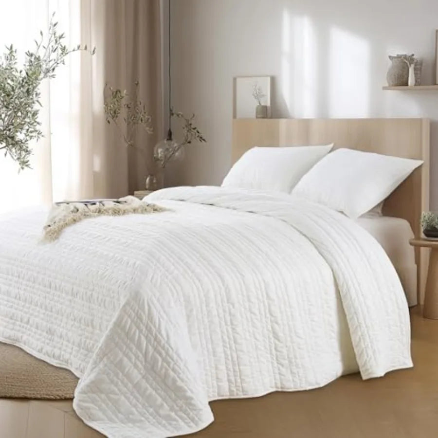 Elegant & Ultra-soft Queen Size 3-Piece White Velvet Quilt Set displayed on a stylish bed, showcasing the luxurious texture and cozy feel.