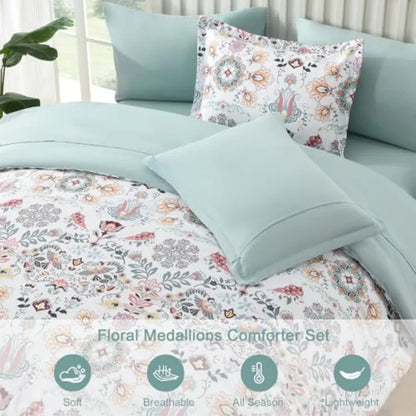 A styled bedroom featuring the Boho Floral Comforter Set Queen set against a calm and airy backdrop.