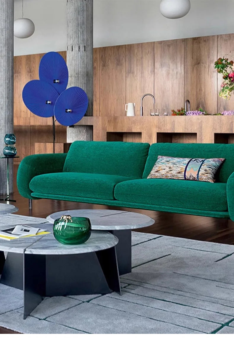 Elegant Modern Triple Floral Floor Lamp illuminating a beautifully styled cafe.