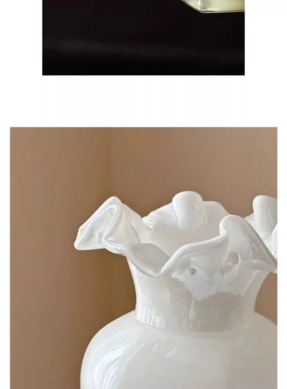 Stylish arrangement featuring the Vintage 24Cm Opalescent Ruffled Edged Fenton Glass Vase with other decor.