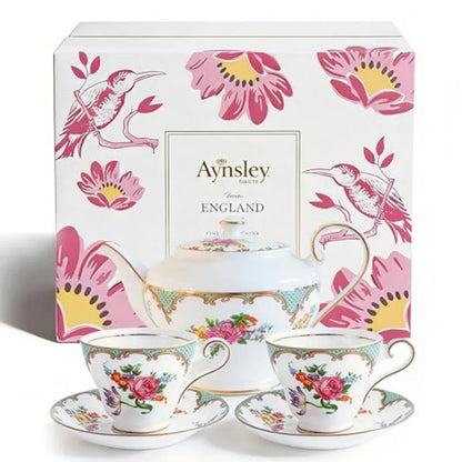 Elegant Aynsley Fine Bone China Tea Set including a teapot, cups, and decorative floral designs.