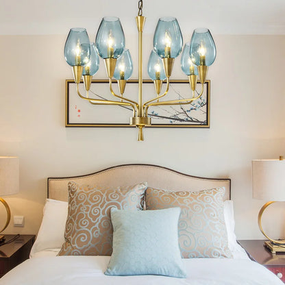 Interior view of the Stunning Modern LED Chandelier in Blue and Matte Brass, demonstrating its unique design and light settings in a stylish living room.