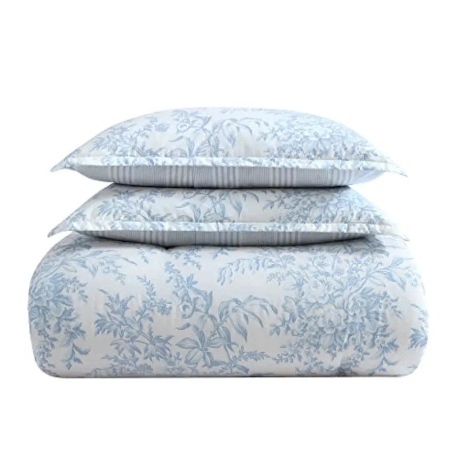 Full view of the Bedford Blue Floral Comforter Set styled on a bed, accentuating its charming floral pattern and cozy aesthetic.