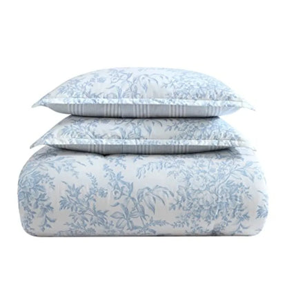 Full view of the Bedford Blue Floral Comforter Set styled on a bed, accentuating its charming floral pattern and cozy aesthetic.